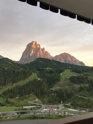 a view of a mountain from a window at Pension Dolomieu in Santa Cristina in Val Gardena