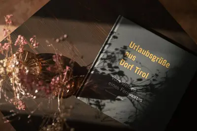 a book sitting on top of a table at Apartment Pyrus in Tirolo