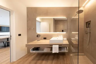 a wine tasting room with a desk and a window at Weingut Gasshof in Appiano sulla Strada del Vino