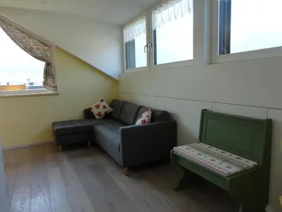 a bedroom with a bed and a window at Appartamento Riscone Nuvola di Plan in Brunico