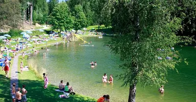 a group of people in the water at a park at Appartamento Riscone Nuvola di Plan in Brunico