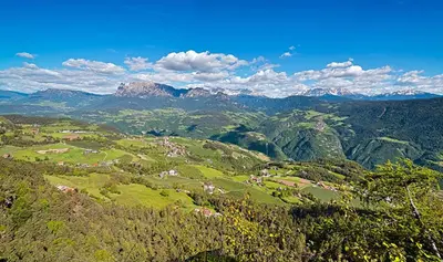 an aerial view of a valley in the mountains at Vidora Apartments in Soprabolzano