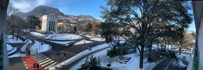 a view of a street with snow on the ground at CASA VITTORIA - SIEGESHAUS in Bolzano
