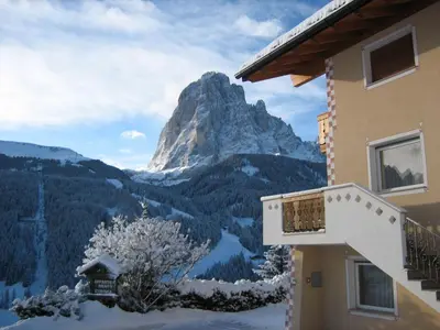 a building with a view of a mountain at Apartments Etruska in Santa Cristina in Val Gardena