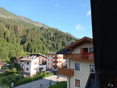 a view of a town with a mountain at La Mansarda di Sabina. in Fiera di Primiero
