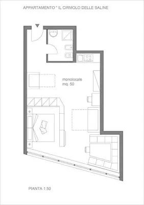 a group of four beds in a room at Il Cirmolo delle Saline in Falcade