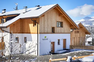 a home in the winter with snow at Huberhof in San Lorenzo di Sebato