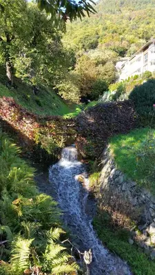 a painting of a river with a waterfall at Ruhige Ferienwohnung mit Garten und Garage in Privatvilla in Marlengo