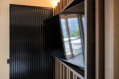 a staircase with a window in a building at MONTARA living mountain air in Terento