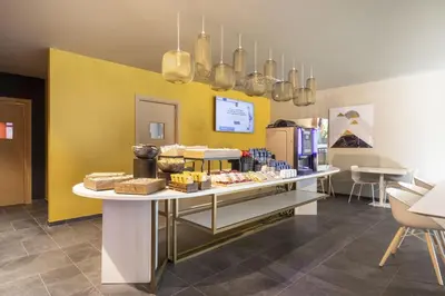 a store with a table with food on it at B&B Hotel Bolzano in Bolzano