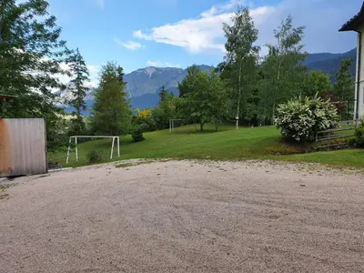 a driveway with a soccer field and a goal at Mansarda 4 posti letto in Villa a Borca di Cadore in Villanova