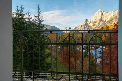 a balcony with a view of the mountains at Mansarda 4 posti letto in Villa a Borca di Cadore in Villanova