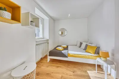 a small bedroom with a bed and a window at HOMESTWENTY3 - Home two in Caldaro
