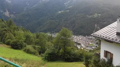a view of a small town in the mountains at Casa Alpina in Cencenighe