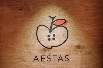 a drawing of an apple on a wooden door at Höllerhof Brixen in Albes