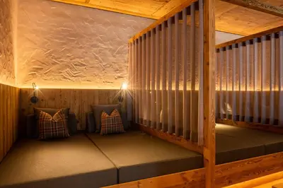 a room with glass walls and a large window at Residence Iris in Valdaora