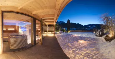 a window with a curtain with snow on it at Residence Iris in Valdaora