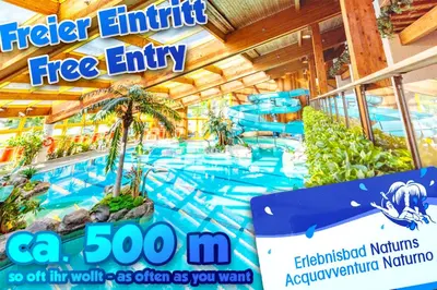 a large pool at a water park at Hof Schupfer - Alpstay in Naturno