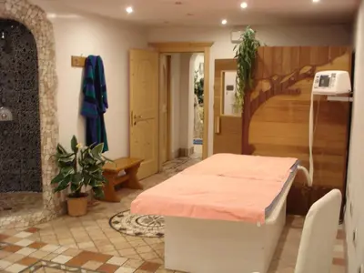 a hospital room with a bed and a staircase at Residence Holiday in Pozza di Fassa