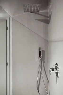 a shower in a bathroom with a shower at Stufels 7 Design Apartment with Brixen Card in Bressanone
