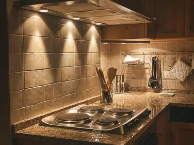 a kitchen counter with a stove top in a kitchen at Una Perla a Cortina in Cortina dʼAmpezzo