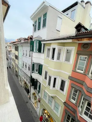 a group of buildings on a city street at Lauben Suite Old Town Bolzano in Bolzano