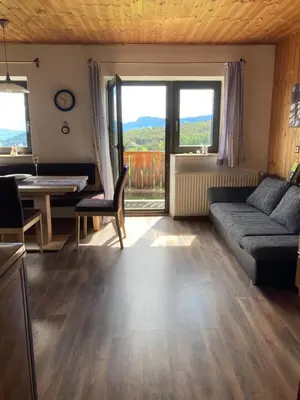 a living room with a couch and a table at Rempphof in San Genesio Atesino