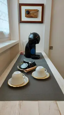 two plates and a helmet sitting on a table at MAISON MY LIFE in Bolzano