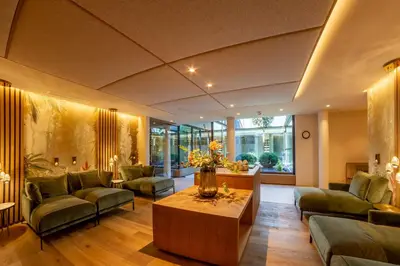 a living room with couches and a coffee table at Tyrol family retreat in Naturno