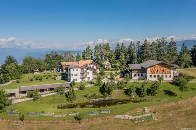 an aerial view of a house on a hill at Ansitz Velseck-Residence Hotel in Tires