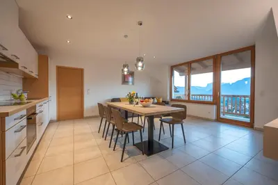 a kitchen and dining room with a table and chairs at Weingut Lahn zu Eppan in Appiano sulla Strada del Vino