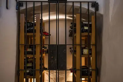 a view through a gate into a room at Weingut Lahn zu Eppan in Appiano sulla Strada del Vino