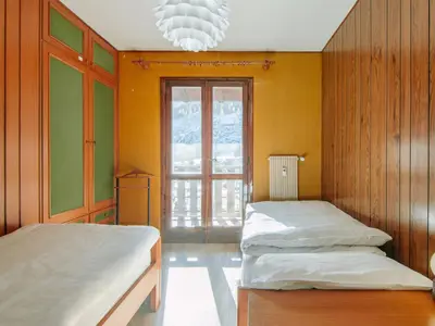a small laundry room with a washer and dryer at Apartment Condominio al Parco-9 by Interhome in Canazei