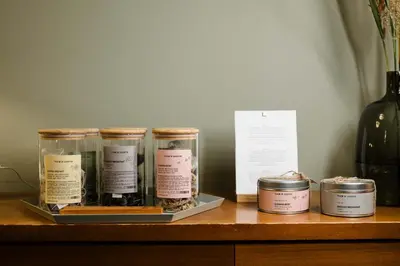 a group of four jars on top of a table at Residence Isarcus in Bressanone
