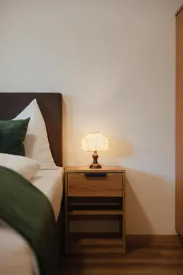 a bedroom with a large bed and a window at Residence Arche Noah - Colfosco in Colfosco
