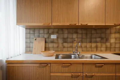 a bathroom with a sink and a toilet and a window at Residence Arche Noah - Colfosco in Colfosco