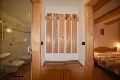 a bathroom with a shower and a toilet and a sink at Casa De Guidi in Meida