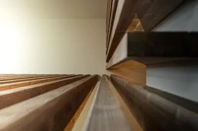 a row of wooden stairs in a room at Chalet Insignis in Santa Cristina in Val Gardena