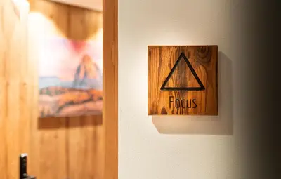 a close up of a door with a danger sign on it at Chalet Insignis in Santa Cristina in Val Gardena