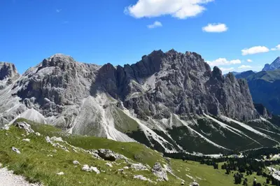 a view of a mountain range with a green field at App Schlossblick - Wohnung Hammerwand 2 in Umes