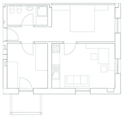 a bedroom with a bed and a table and a window at Residence Bad Bergfall in Valdaora