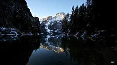 a view of a river with a mountain in the background at Crioli Dolomiti Lodge in Villabassa