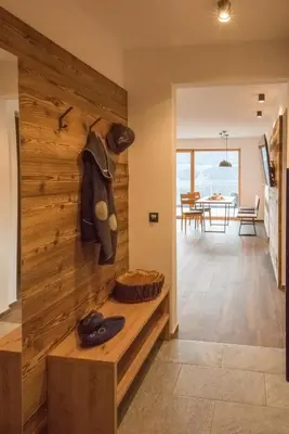 a hallway of a house with a wooden wall at Jaufnerhof in Mareta