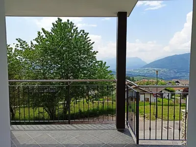 a balcony with a view of a tree at Casa Martina in Malosco