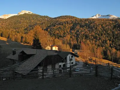 a house in the middle of a mountain at THOMASERHOF in Redagno