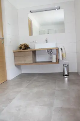 a bathroom with a sink and a mirror at Garni Wiesenhof in Naturno