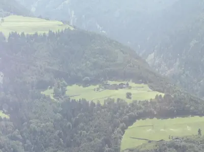 a view of a valley with trees on a mountain at Garni Wiesenhof in Naturno