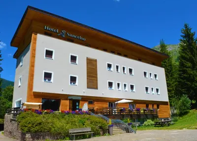 a building with a sign that reads hotel and banquet at Park Hotel Sancelso in Bellamonte