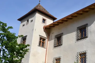 a building with windows and a tower at Ansitz Lidl in Tesimo