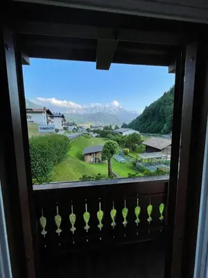 a window with a view of a mountain view at Casa da Rina in Siror